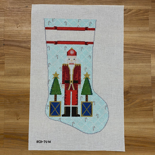 Santa Nutcracker with Stars on Blue Stocking