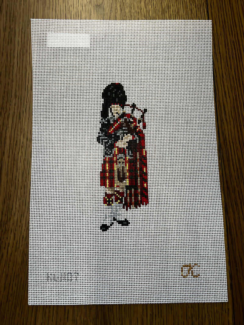 Kate Woodward ·  Bagpiper Front