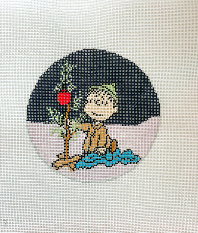 PEANUTS "A Charlie Brown Christmas" - Linus Kneeling Wrapping Blanket Around Tiny Tree