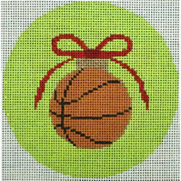 basketball with red bow on green