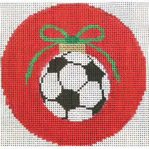 soccer ball with green bow on red