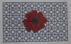 red flower on blue geometric