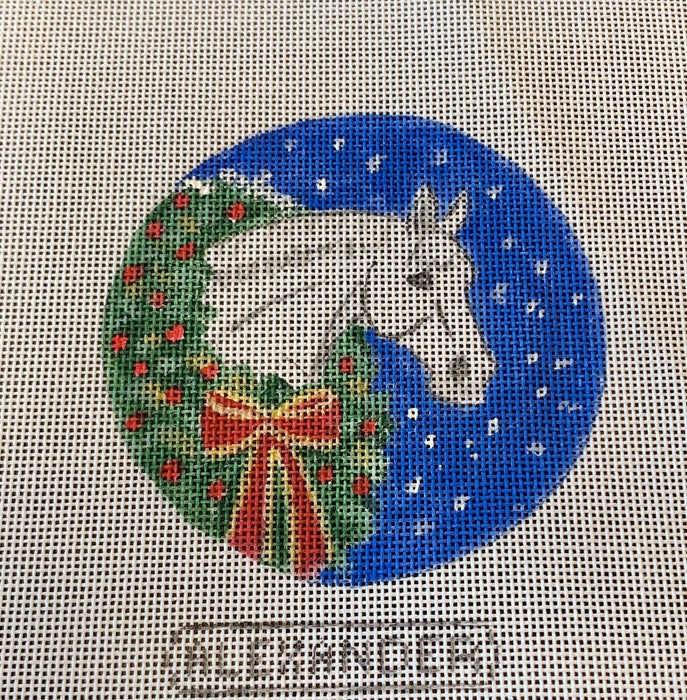 White pony with Christmas Wreath