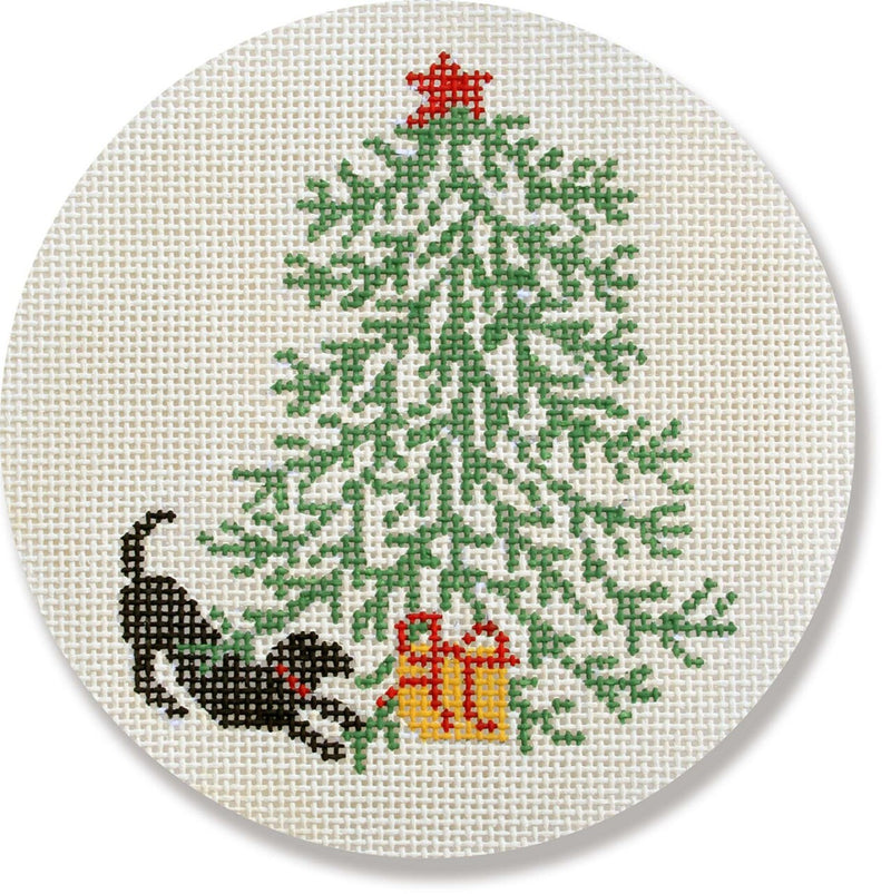 Black Lab under Christmas Tree